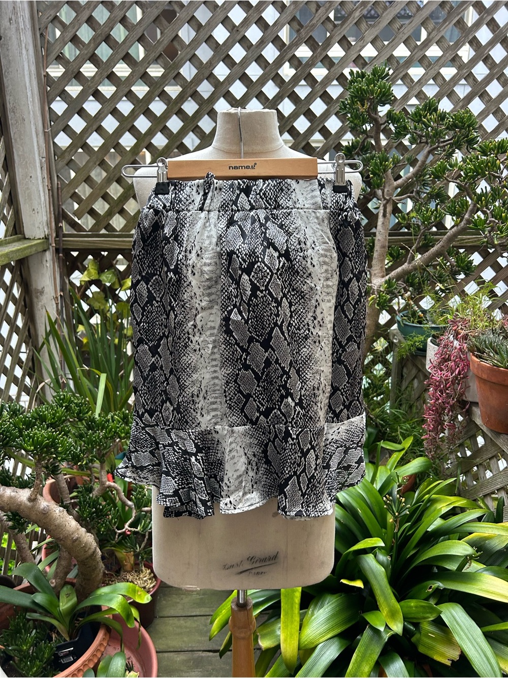 Poof! Black & White Snake Print Mini Skirt with Ruffle Hem